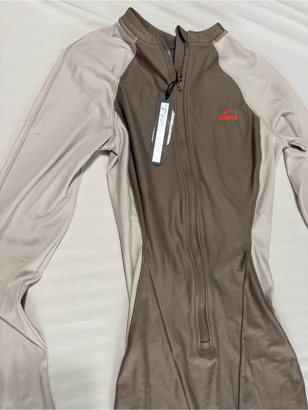 Nike skims shine color block zip front one piece